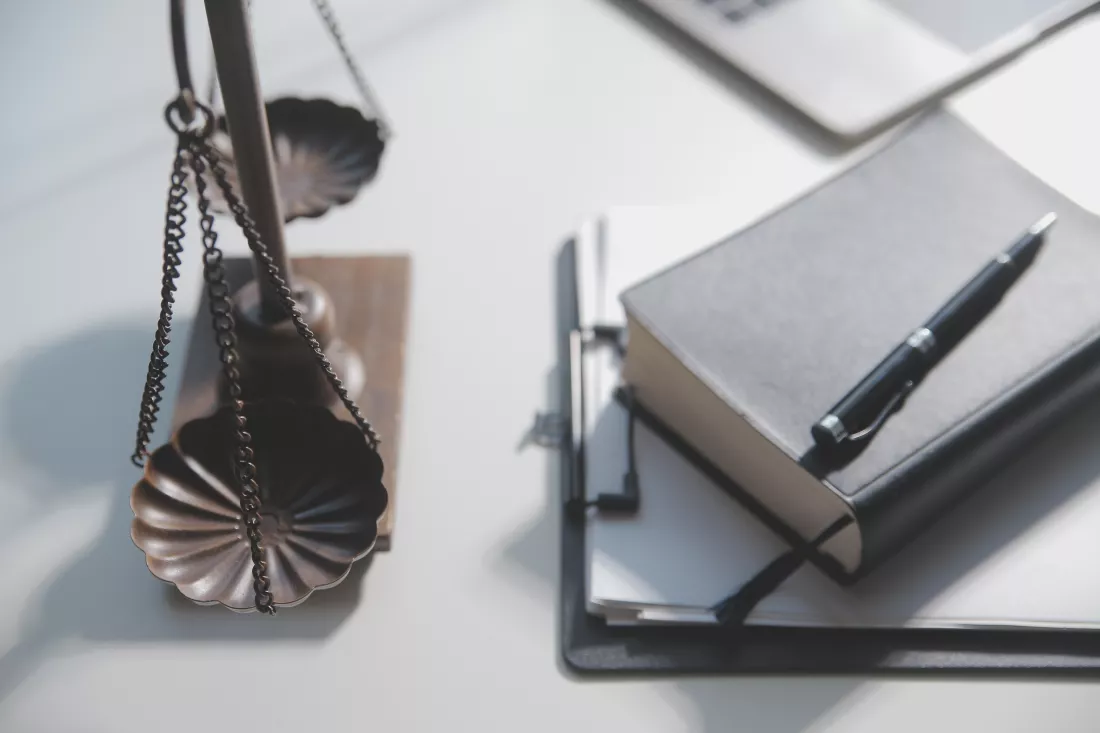 business-lawyers-discussing-contract-papers-with-brass-scale-desk-office-law-legal-services-advice-justice-law-concept-picture-with-film-grain-effect(5)