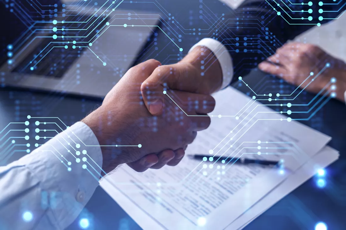 handshake-two-businessmen-who-enters-into-contract-develop-new-software-improve-business-service-company-technological-icons-table-with-document